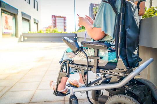 disabled young woman in wheelchair