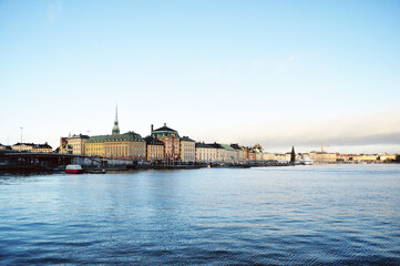 STOCKHOLM, SWEDEN: Scenic cityscape view of old city center Gamla Stan with colorful buildings near the water