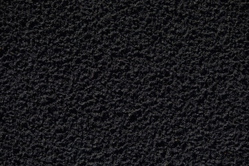 Fototapeta premium natural texture of black sand close-up