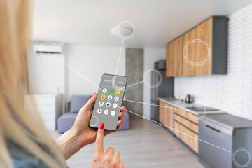 Smart home control on phone. Phone in woman hand. Living room interior in background