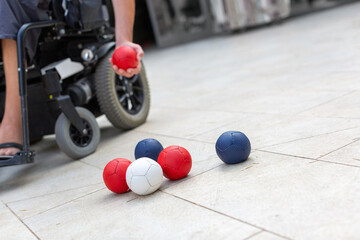 Disabled Boccia player playing on a wheelchair