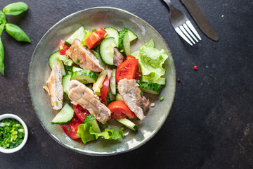 salad chicken meat breast vegetable tomato, cucumber, lettuce diet food meal snack on the table copy space food background rustic top 