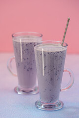 Fresh berry smuzzi with milk in glass