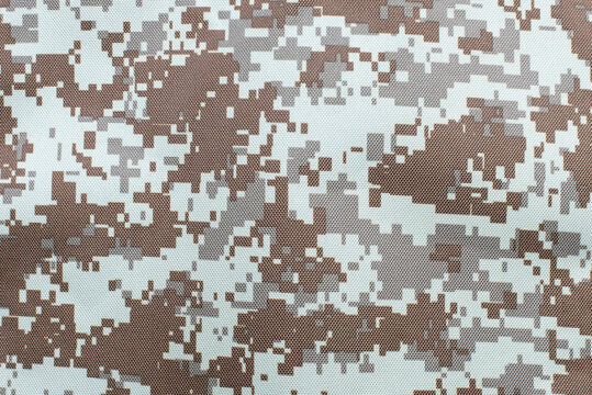 Textured durable fabric with a print of protective military clothing, in such clothing soldiers become almost invisible on the battlefield
