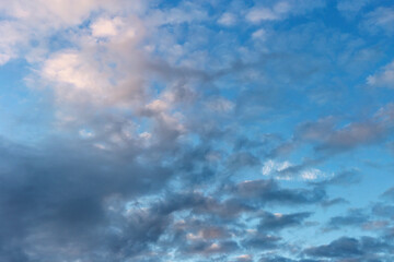 colorful textured blue sky at the end of a summer day