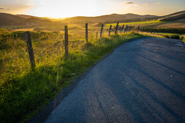 Country Road In Scotland At Sunset