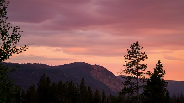 Timelapse of colorful sunset over the Uinta Mountains in Utah on summer night.