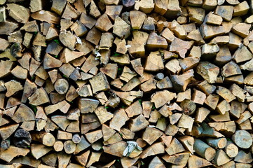 A pile of firewood - obrazy, fototapety, plakaty