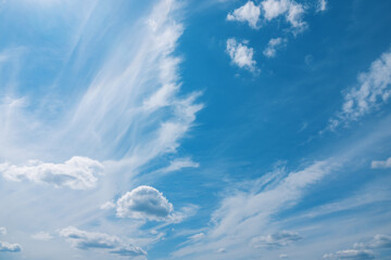 Filiform clouds over blue sky. Natural background.