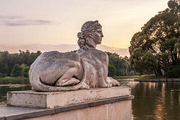 ancient sculpture of the sphinx on the descent to the pond in the park, Tsaritsyno, Moscow, Russia