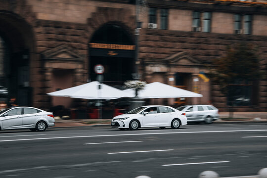 Ukraine, Kyiv - 2 June 2021: White Toyota Corolla Altis car moving on the street. Editorial