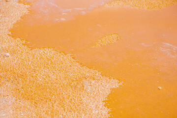 Lake Koyashskoye. see the pink-orange water in which islands of salt float