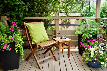 Outdoor oasis setting in secluded backyard deck at summer vacation rental in lush, luxury setting...