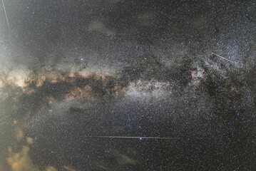 Bright panoramic milky way galaxy  on the starry sky.  Space wallpaper. Astronomical background.
