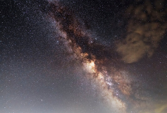 Beautiful bright milky way galaxy on the dark sttary sky. Space, astronomical background. Space wallpaper. © Inga Av
