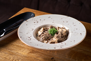 buckwheat spaghetti. Buckwheat noodles with a mix of forest mushrooms.