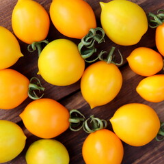 yellow organic tomatoes close-up selective focus, fresh vegetables.