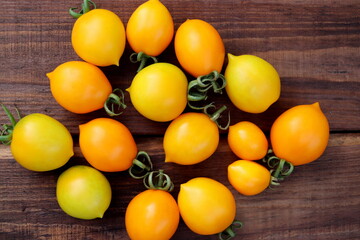 yellow organic tomatoes close-up selective focus, fresh vegetables.