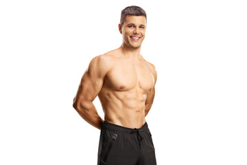 Fit guy posing shirtless and smiling at camera