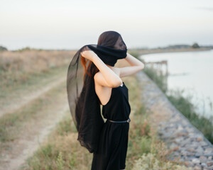 woman in black veil outdoors travel fashion fresh air