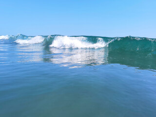 wave in the sea in sun