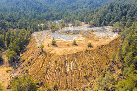 Mining stock piles at abandoned site of copper mine in Paphos forest, Cyprus. Aerial view