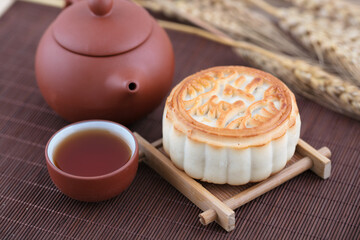 Zisha tea set with tea and a moon cake