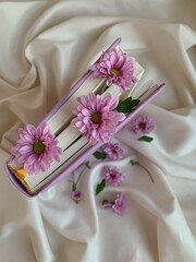 wedding rings on a bouquet of flowers