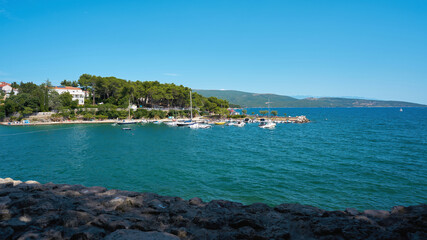 View from the city wall to the beach Punta Di Galetto on the Adriatic Sea on the outskirts of the town Krk in Croatia