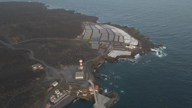 Aerial dolly in shot of salt production complex, La Palma, Spain