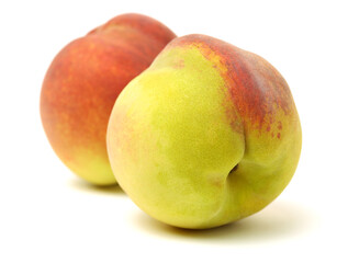 ripe peach on white background 