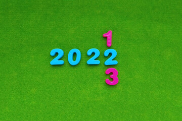 The figures are 2022, with the transition to 2023 on a green background. The new year is coming.