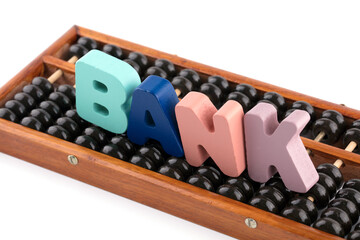 Naklejka premium Chinese abacus and the English word bank on it