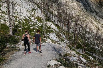 Mother and teenaged son hiking in the Canadian Rockies