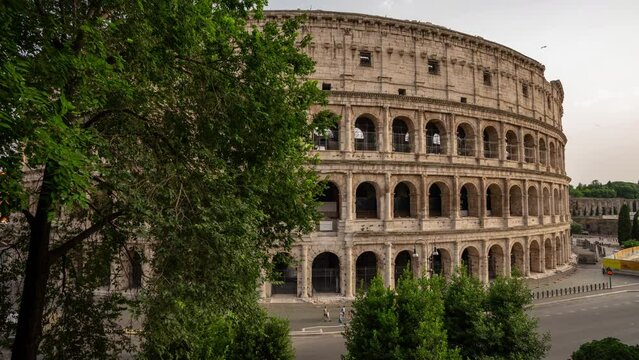 hyperlapse of the side of Colosseum in Rome. Amazing architecture details from the left side of this big oval amphitheatre in the centre of the city of Rome, Italy. Colosseo, Roma close to far