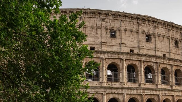 hyperlapse of the side of Colosseum in Rome. Amazing architecture botton up details from the left side of this big oval amphitheatre in the centre of the city of Rome, Italy. Colosseo, Roma