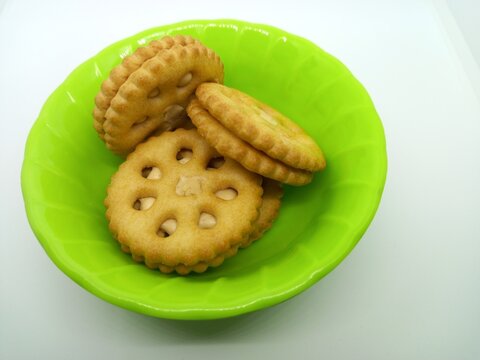 Peanut Biscuits On Melamine Plate With White Background