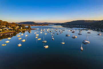 Early morning aerial waterscape with boats