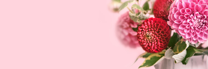 Banner with Autumn bouquet of beautiful flowers. Autumn festive decoration in pink colors, selective focus