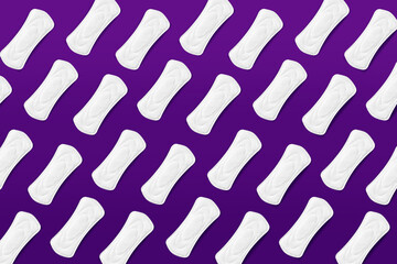 Many menstrual pads on color background