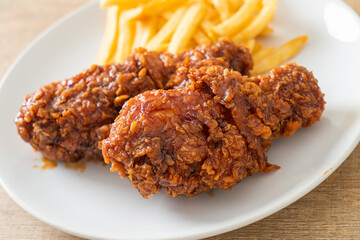 spicy Korean fried chicken with fries