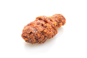 fried chicken with spicy Korean sauce on white background