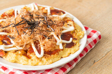 Japanese Traditional Pizza that called Okonomiyaki