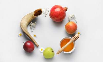 Frame made of symbols of Rosh hashanah (Jewish New Year) on light background