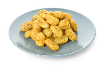 Plate with tasty pesto gnocchi on white background