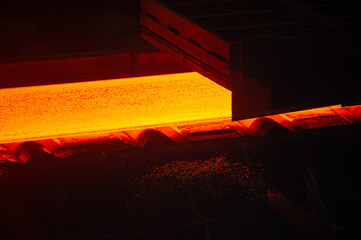 Hot rolled steel production process in the metallurgical industry. Hot metal sheet on a conveyor...