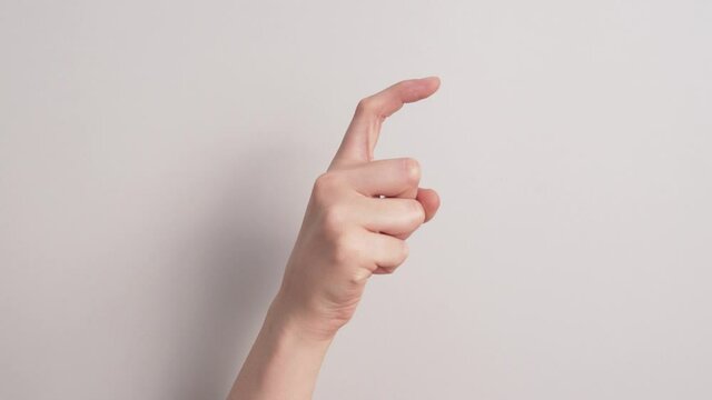 Hand Showing Letter X Isolated On White Background - close up