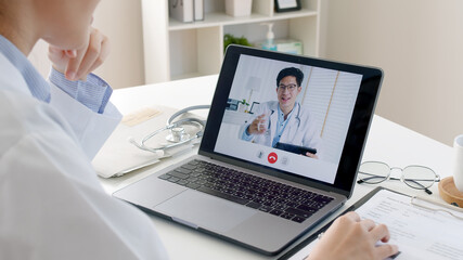Asia medic people or nurse man woman staff in labcoat work online remotely talk on phone at office...