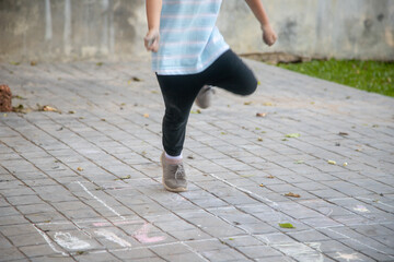 girl on the hopscotch