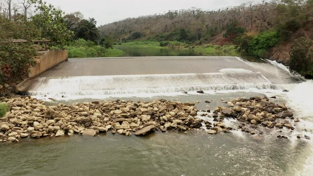 Traveling front over a river, dam on a river in Angola, Africa 2